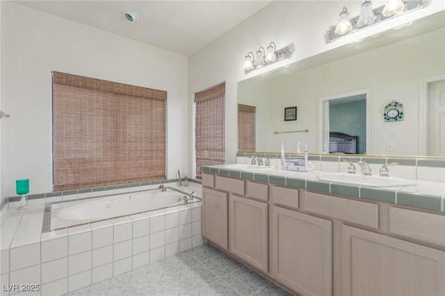 3821 Tumbleweed Ave, Pahrump, NV 89048 - bathroom with double vanity, a bath, and tile patterned flooring