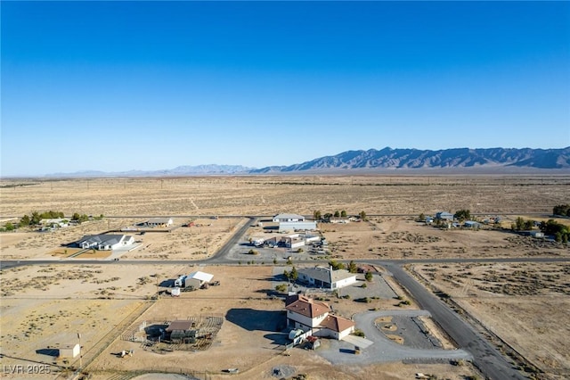 3821 Tumbleweed Ave, Pahrump, NV 89048 - aerial view of sparsely populated area featuring a desert landscape and a mountainous background