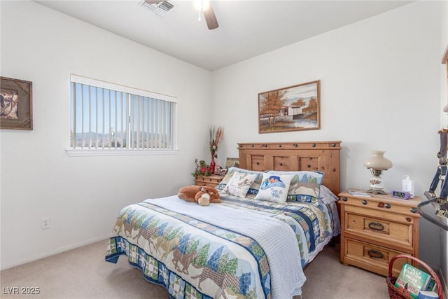 3821 Tumbleweed Ave, Pahrump, NV 89048 - bedroom featuring light colored carpet and a ceiling fan