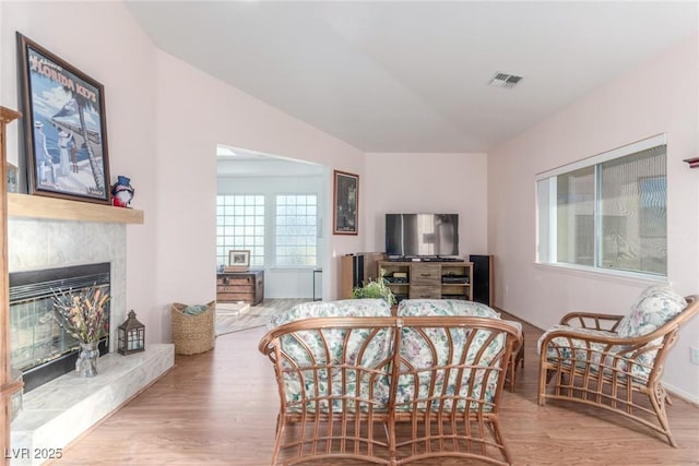 3821 Tumbleweed Ave, Pahrump, NV 89048 - dining room featuring wood finished floors and a fireplace