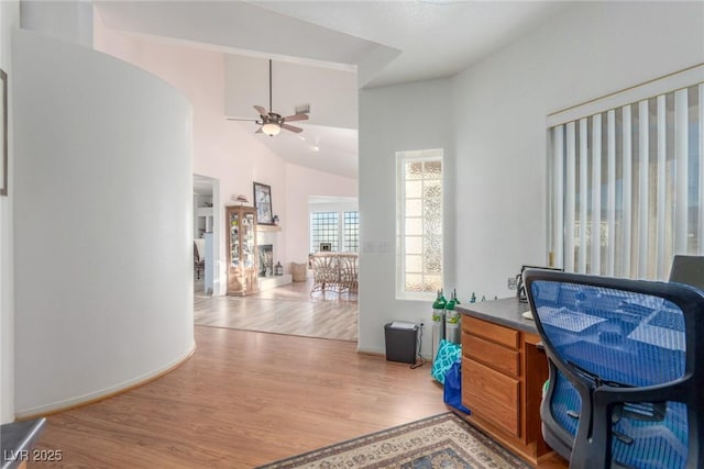 3821 Tumbleweed Ave, Pahrump, NV 89048 - home office featuring wood finished floors, a ceiling fan, and high vaulted ceiling