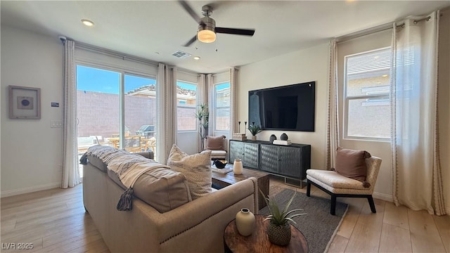 739 Wild Highlands Ln, Henderson, NV 89015 - living room with light wood-type flooring, ceiling fan, and recessed lighting