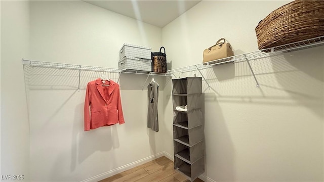 739 Wild Highlands Ln, Henderson, NV 89015 - walk in closet with wood finished floors