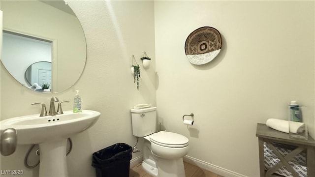 739 Wild Highlands Ln, Henderson, NV 89015 - bathroom with toilet and tile patterned floors