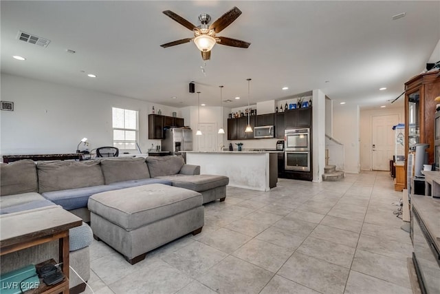 889 Harbor Ave, Henderson, NV 89002 - living room featuring ceiling fan, light tile patterned floors, recessed lighting, and stairs