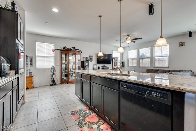 889 Harbor Ave, Henderson, NV 89002 - kitchen featuring dishwasher, open floor plan, ceiling fan, light stone countertops, and hanging light fixtures
