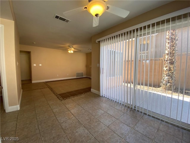 7604 Cruz Bay Ct, Las Vegas, NV 89128 - tiled empty room with ceiling fan and baseboards