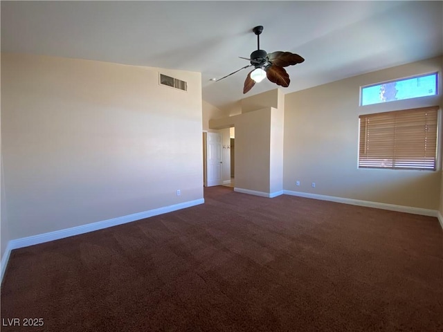 7604 Cruz Bay Ct, Las Vegas, NV 89128 - unfurnished room with a ceiling fan, dark colored carpet, and vaulted ceiling