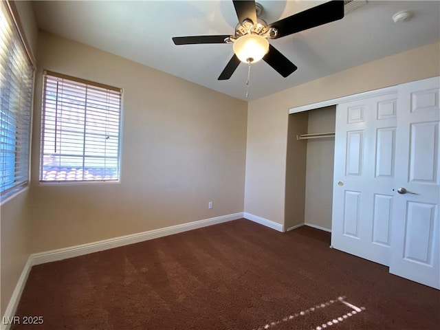 7604 Cruz Bay Ct, Las Vegas, NV 89128 - unfurnished bedroom featuring dark carpet, a closet, and a ceiling fan