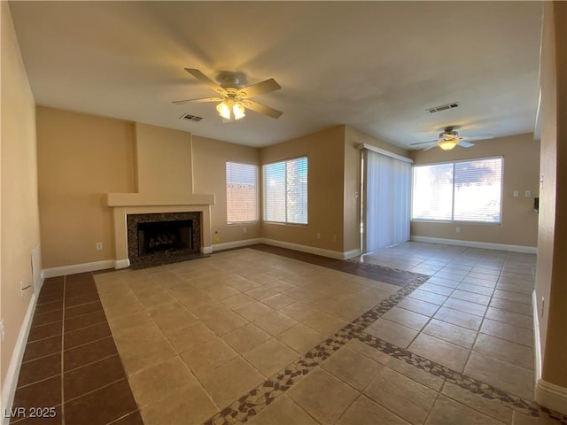 7604 Cruz Bay Ct, Las Vegas, NV 89128 - unfurnished living room featuring a ceiling fan, a premium fireplace, and tile patterned flooring