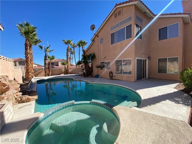 7604 Cruz Bay Ct, Las Vegas, NV 89128 - view of pool with a pool with connected hot tub, a fenced backyard, and a patio area