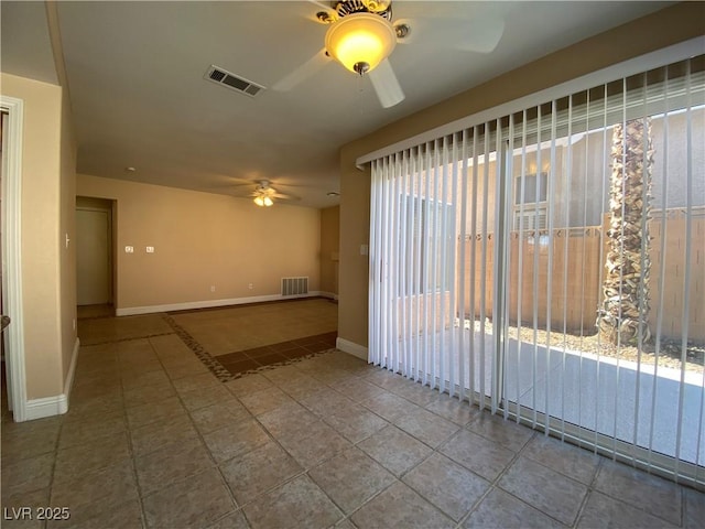 7604 Cruz Bay Ct, Las Vegas, NV 89128 - empty room featuring a ceiling fan and tile patterned flooring