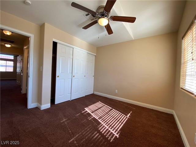 7604 Cruz Bay Ct, Las Vegas, NV 89128 - unfurnished bedroom with carpet floors, a closet, and a ceiling fan