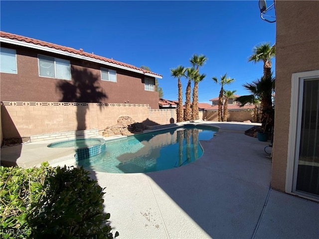 7604 Cruz Bay Ct, Las Vegas, NV 89128 - view of pool featuring a fenced backyard, a patio area, and a pool with connected hot tub