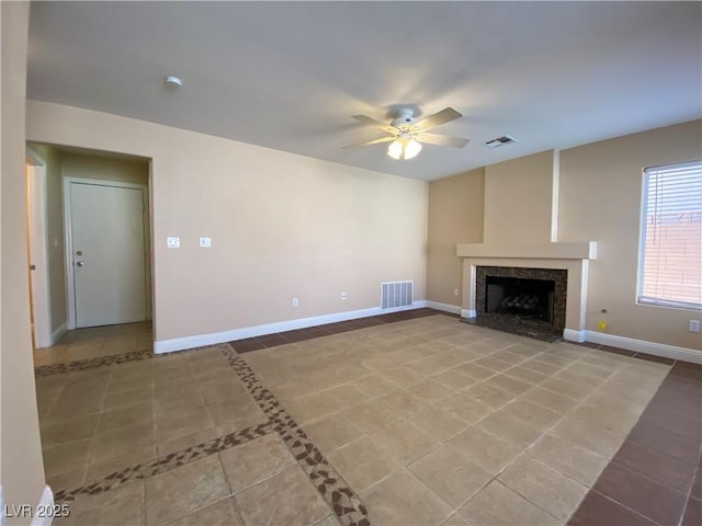 7604 Cruz Bay Ct, Las Vegas, NV 89128 - unfurnished living room with tile patterned flooring, ceiling fan, and a fireplace