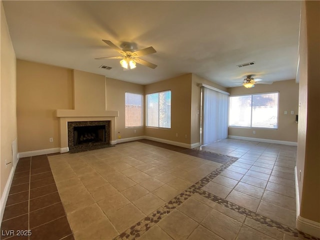 7604 Cruz Bay Ct, Las Vegas, NV 89128 - unfurnished living room with a ceiling fan, a premium fireplace, and tile patterned floors