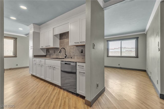4272 Sheppard Dr, Las Vegas, NV 89121 - kitchen with dishwashing machine, ornamental molding, light wood-style flooring, decorative backsplash, and healthy amount of natural light