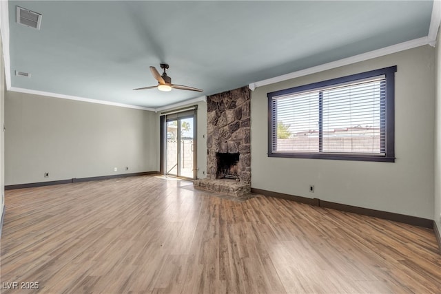4272 Sheppard Dr, Las Vegas, NV 89121 - unfurnished living room featuring ornamental molding, ceiling fan, wood finished floors, and a fireplace