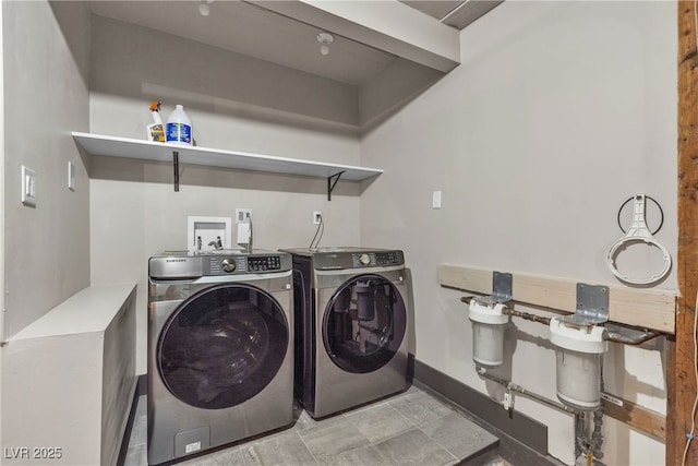 4272 Sheppard Dr, Las Vegas, NV 89121 - washroom with washing machine and dryer and baseboards