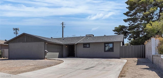 4272 Sheppard Dr, Las Vegas, NV 89121 - single story home with an attached garage, concrete driveway, and stucco siding