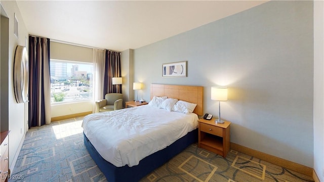 211 E Flamingo Rd Unit 202, Las Vegas, NV 89169 - carpeted bedroom featuring baseboards
