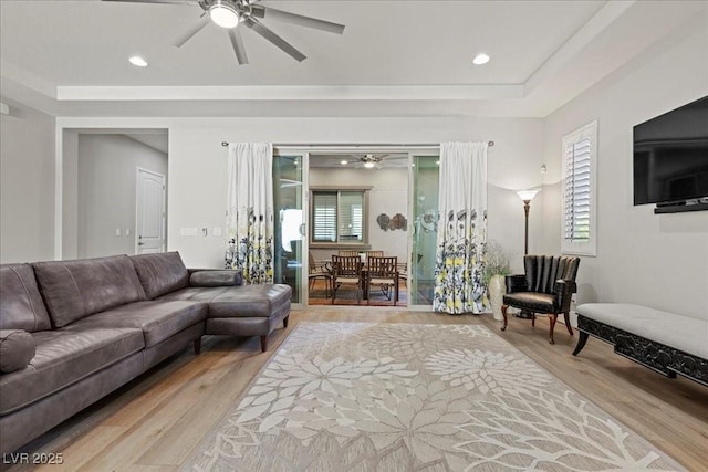 251 Castellari Dr, Las Vegas, NV 89138 - living area with ceiling fan, light wood-style flooring, a tray ceiling, and recessed lighting