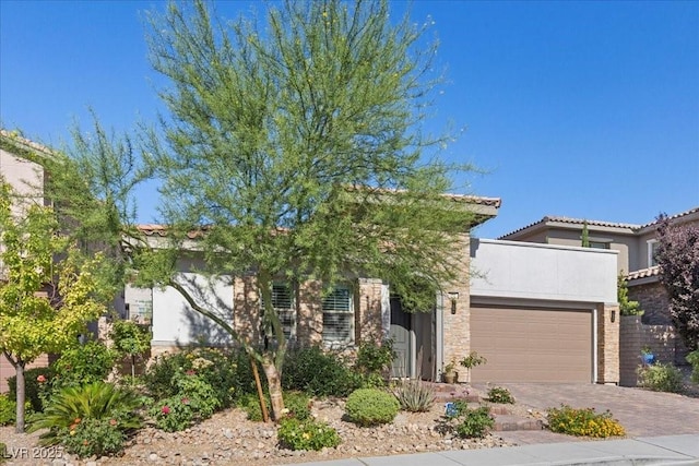 251 Castellari Dr, Las Vegas, NV 89138 - view of front of house with an attached garage, driveway, and stucco siding
