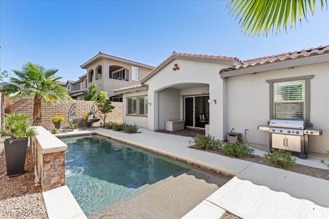 251 Castellari Dr, Las Vegas, NV 89138 - rear view of house with a tile roof, stucco siding, and a patio area