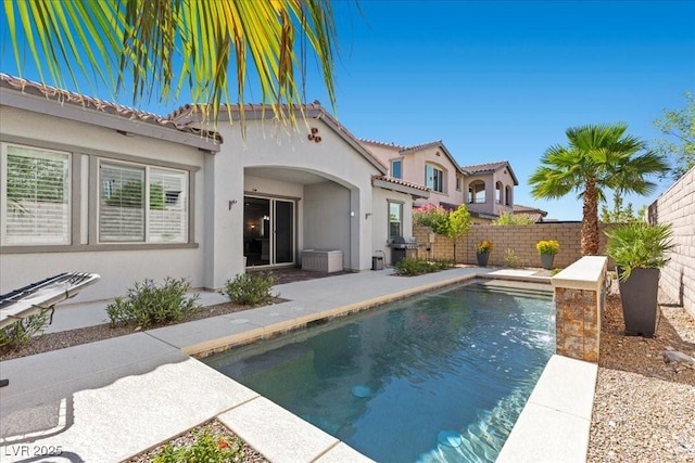 251 Castellari Dr, Las Vegas, NV 89138 - view of swimming pool featuring a fenced backyard, a grill, and a patio