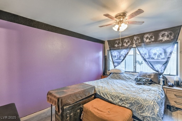 2450 Tournament St, Las Vegas, NV 89142 - bedroom with wood finished floors and a ceiling fan