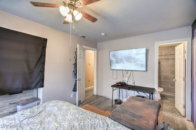2450 Tournament St, Las Vegas, NV 89142 - bedroom with wood finished floors, a ceiling fan, and ensuite bathroom