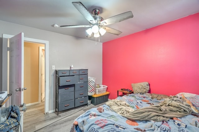 2450 Tournament St, Las Vegas, NV 89142 - bedroom with wood finished floors and a ceiling fan
