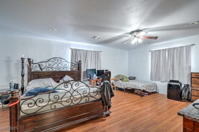 2450 Tournament St, Las Vegas, NV 89142 - bedroom featuring light wood-style flooring and a ceiling fan