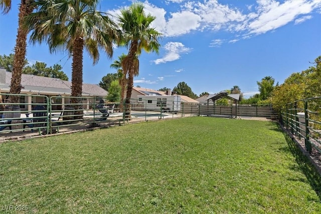 7675 Butterscotch Ct, Las Vegas, NV 89131 - view of yard with an exterior structure and an outdoor structure