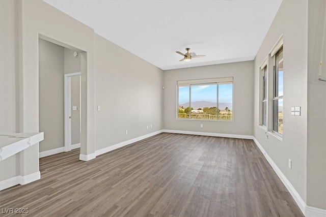 10700 Button Willow Dr, Las Vegas, NV 89134 - spare room with a ceiling fan and wood finished floors