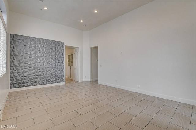 3200 Ridgecliff St, Las Vegas, NV 89129 - spare room featuring recessed lighting and a towering ceiling