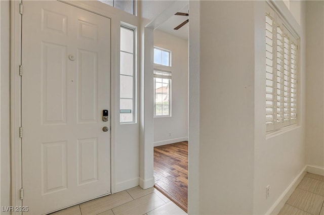 3200 Ridgecliff St, Las Vegas, NV 89129 - foyer entrance with baseboards and a ceiling fan