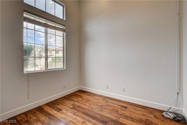 3200 Ridgecliff St, Las Vegas, NV 89129 - empty room with baseboards and wood finished floors