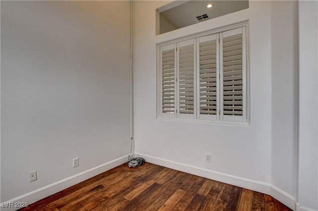 3200 Ridgecliff St, Las Vegas, NV 89129 - empty room with dark wood finished floors and recessed lighting