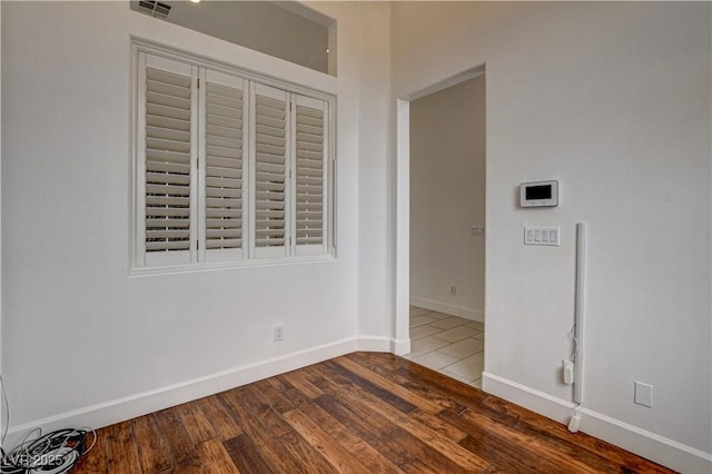3200 Ridgecliff St, Las Vegas, NV 89129 - spare room featuring wood finished floors and baseboards