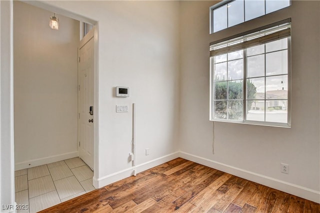 3200 Ridgecliff St, Las Vegas, NV 89129 - entryway featuring baseboards and wood finished floors