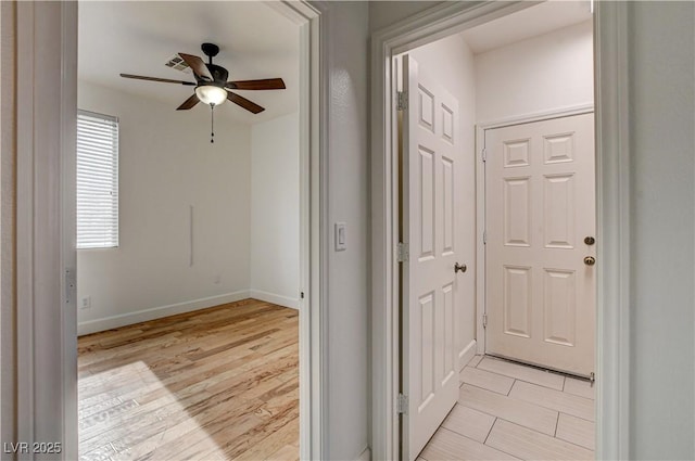 3200 Ridgecliff St, Las Vegas, NV 89129 - hallway with baseboards and light wood-type flooring
