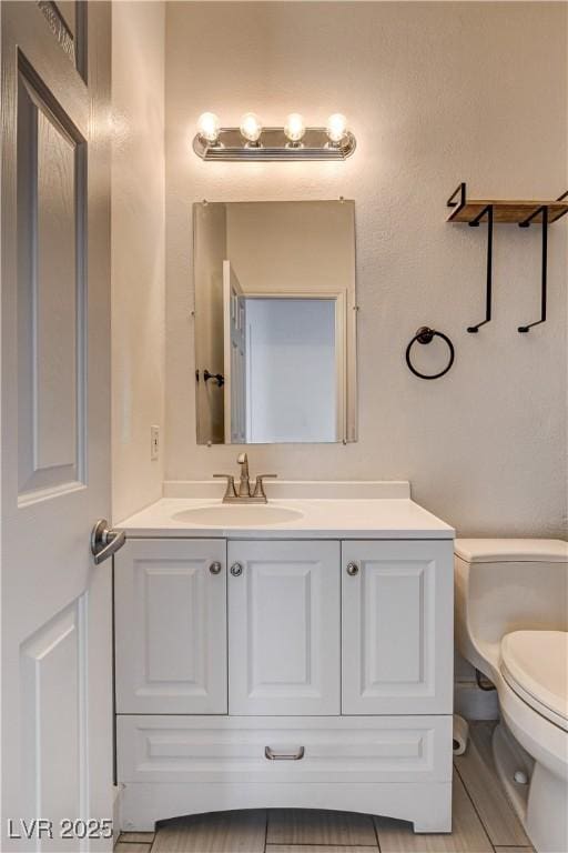 3200 Ridgecliff St, Las Vegas, NV 89129 - bathroom featuring vanity and toilet