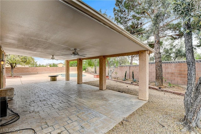 3200 Ridgecliff St, Las Vegas, NV 89129 - fenced backyard featuring a ceiling fan and a patio