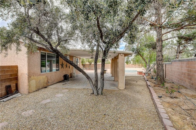 3200 Ridgecliff St, Las Vegas, NV 89129 - fenced backyard with a patio