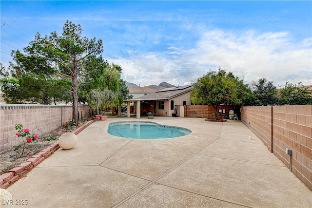 3200 Ridgecliff St, Las Vegas, NV 89129 - view of swimming pool with a patio area and a fenced backyard