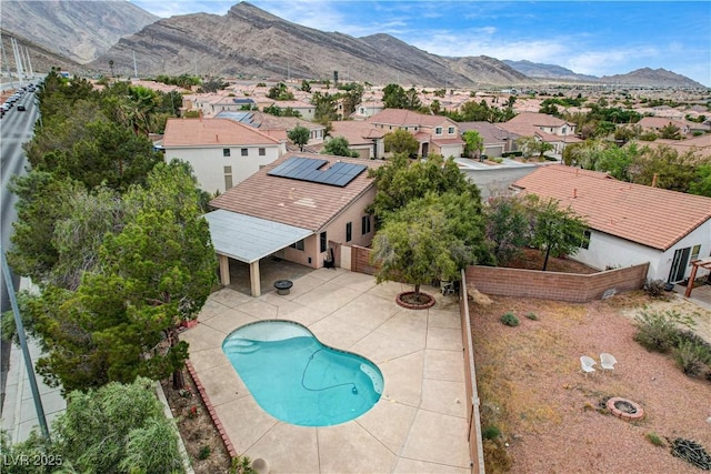 3200 Ridgecliff St, Las Vegas, NV 89129 - view of swimming pool featuring a patio area, a residential view, a mountain view, and a fenced backyard