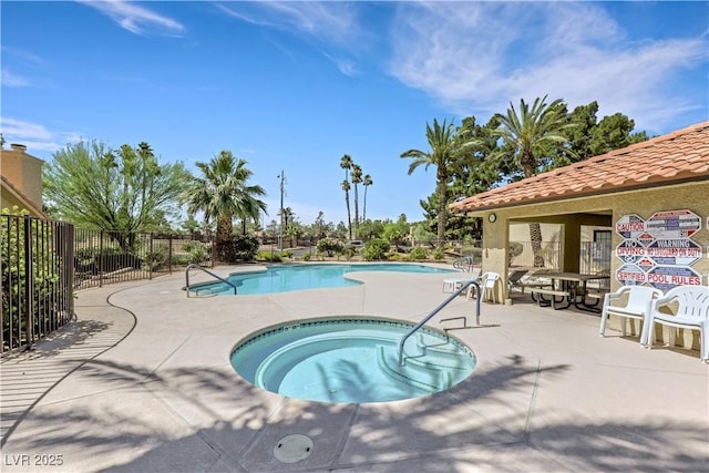 7909 Canoe Ln, Las Vegas, NV 89145 - community pool with a hot tub and a patio