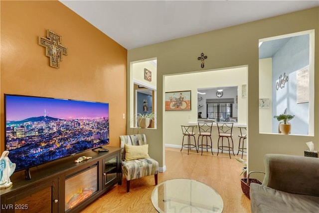 7909 Canoe Ln, Las Vegas, NV 89145 - living area featuring wood finished floors and baseboards