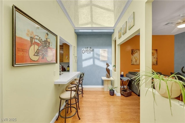 7909 Canoe Ln, Las Vegas, NV 89145 - hallway featuring wood finished floors and baseboards